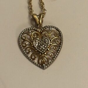 Elegant Gold and Silver Heart Pendant Necklace